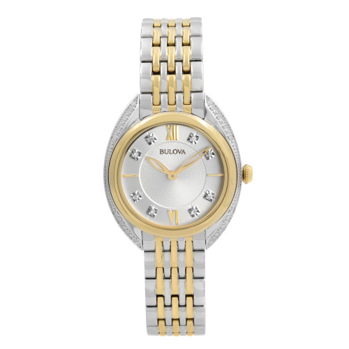 An image of a Bulova women's dress/formal wristwatch in excellent condition. The watch is presented in a full frontal view, centered in the frame at a close distance, allowing clear visibility of details. It features a round stainless steel case with a yellow gold-tone bezel adorned with diamonds. The silver dial showcases diamond markers at the 3, 6, 9, and 12 o'clock positions, accompanied by Roman numerals and stick indexes. The two-tone stainless steel bracelet combines silver and yellow gold-tone links. The Bulova logo is visible just below the 12 o'clock position.