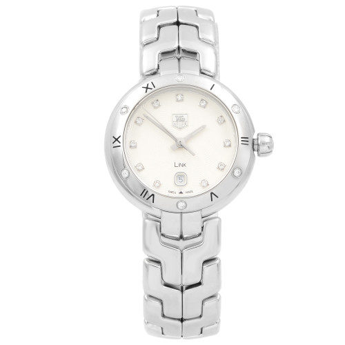 An image of a Wristwatch by TAG Heuer. This Pre Owned item is designed for Women, featuring a Dress/Formal style. It has a Quartz movement and an Analog display with a Silver dial color. The indices include Diamonds. The band is made of Stainless Steel and the case is made of Stainless Steel. The watch has a Round shape with a case size of 28 mm and a case thickness of 9 mm.