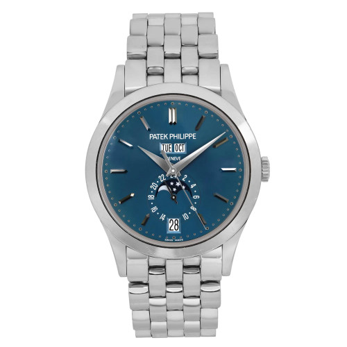 An image of a pre-owned men's Patek Philippe Day-Date Annual Calendar White Gold Blue Dial Watch 5396/1G-001 positioned upright at a straight-on angle. The watch features a white gold bracelet and a blue dial with a date indicator and moon phase complication. The brand name is visible beneath the 12 o'clock position. The watch is centered in the frame, showcasing its design and features clearly.