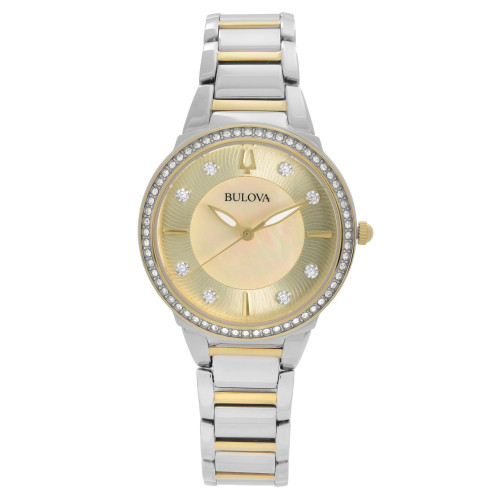 An image of a Bulova women's wristwatch, displayed in a frontal view with the face of the watch centered and the band extending vertically. The watch features a gold-tone dial, luminous hands, and diamond hour markers, surrounded by a ring of additional crystals. The two-tone bracelet combines silver and gold elements and appears in a display model condition with no visible wear. The wristwatch is photographed up close, capturing the details and finishes clearly.