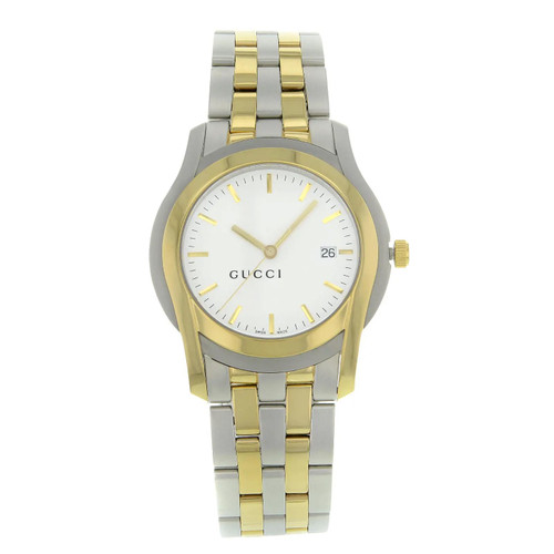 An image of a pre-owned Gucci unisex adult wristwatch in a good condition class, displayed in a full frontal view. The watch features a round, white dial with gold bezel, stick indexes, and a date indicator at the 3 o'clock position. It has a two-tone stainless steel band with gold and silver color segments. The watch is positioned centrally and shot from a direct angle, allowing a clear view of the watch face and band.