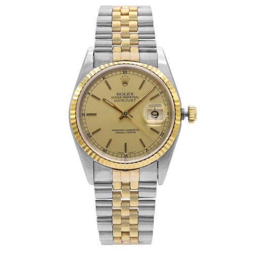 An image of a pre-owned men's luxury Rolex wristwatch in good condition, viewed from a front full frontal angle. The watch features a round champagne sunburst dial with stick indexes and non-numeric hour marks, encased in stainless steel. It has a gold bezel and a date indicator. The band is made of stainless steel and solid gold.
