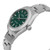 An image of a new wristwatch shown from a side profile view, highlighting the crown. The watch has a metallic band and a green dial, with silver hour markers and hands. The angle reveals the sleek design of the case and the detailed crown, creating a dynamic perspective from a close distance.