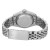An image of a pre-owned wristwatch viewed from the back. The focus is on the closed clasp and stainless steel bracelet. The watch case back is prominently displayed, showcasing engraved details. The angle is slightly elevated, capturing the watch from a close distance, highlighting the craftsmanship and metallic finish.