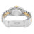 An image of a pre-owned wristwatch showing the back view with an open clasp. The watch is positioned at a slight angle, highlighting the stainless steel and gold-tone bracelet links. The focus is on the watch's back case and the detailed engravings on the clasp, viewed from a moderate distance.