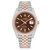 An image of a pre-owned men's Rolex Datejust 41mm wristwatch model 126331, viewed from the front at a straight angle. The watch features a chocolate dial with luminous hands and a date indicator at the 3 o'clock position. The bezel is rose gold, complementing the two-tone everose gold steel metal bracelet. The image is taken at a close distance, highlighting the watch's details and craftsmanship. 