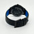 Back View Of Solid Back Case And Closed Leather Band Of Mondaine MH1.L2222.LB Watch Display Model Condition
