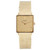 An image of a pre-owned unisex Vintage Patek Philippe Gondolo 18K Yellow Gold Dial Hand Wind Watch 3430, positioned upright and viewed directly from the front. The watch features a square gold face with minimalist hour markers and a textured yellow gold band. The image is taken at a close distance, showcasing the intricate details of the watch's design.