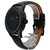 An image of a pre-owned men's GUESS wristwatch, featuring a chronograph, date indicator, day/date function, luminous hands, and a small seconds subdial. The watch is positioned at a slight angle, displaying the face and side profile, with the strap partially curved and visible. The watch is photographed from a medium distance, highlighting its black leather strap and dark watch face.