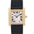 An image of a pre-owned Cartier unisex adult wristwatch, viewed from the front at a close distance. The watch features a rectangular gold case with a black leather strap. The dial displays Roman numerals and includes a date indicator at the 6 o'clock position.