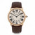 An image of a pre-owned Cartier Ronde Louis 36mm 18K Rose Gold Cream Dial Hand Wind Watch W6800251 positioned upright and facing forward. The watch features a round rose gold case with a cream dial, displaying large black Roman numerals and smaller 24-hour markers. The hands are elegant and black, contrasting with the dial. The crown is adorned with a dark cabochon. The brown leather strap is visible and appears slightly curved. The angle is straight-on, providing a clear view of the watch face, captured at a close distance.