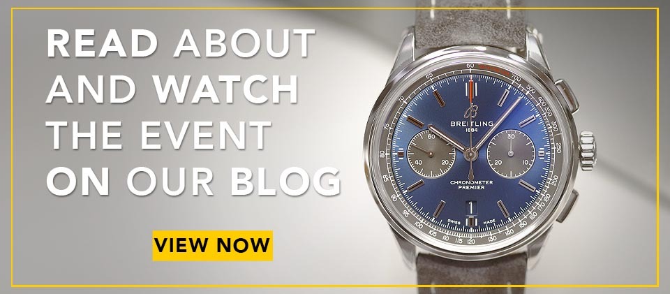 AN IMAGE OF A BREITLING WATCH IN FRONT OF A PLAIN GREY BACKGROUND WITH A SLANTED PORTION WHILE THE ITEM HAS A MAGNIFICENT BLUE VIBRANT DIAL