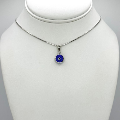 Small Evil Eye Pendant with Metal Backing on Silver Chain with adjustable silver findings.