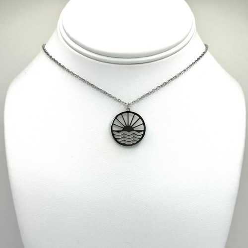 Round Cutout Sun with Rays over Waves Necklace