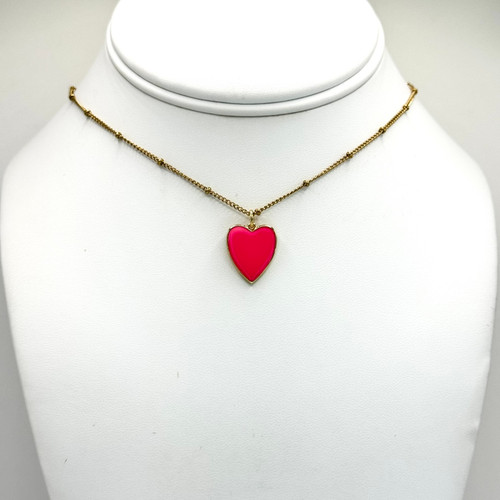 Red Enamel Heart Pendant on a Gold Saturn Chain with adjustable 16inch to 18inch gold findings.
