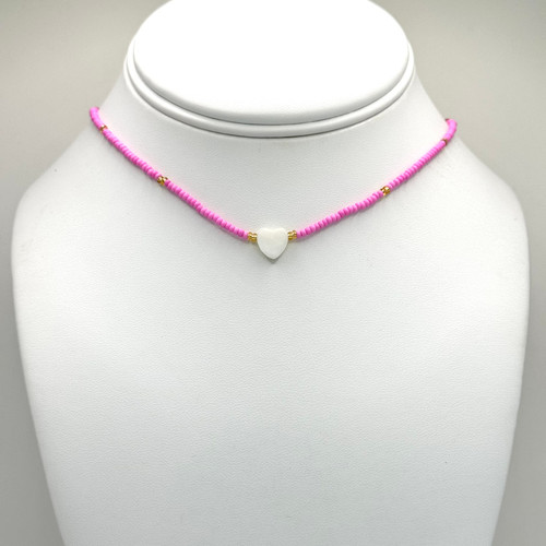 Tiny white heart Pendant on a pink beaded 16inch to 18inch Chain with adjustable gold findings.