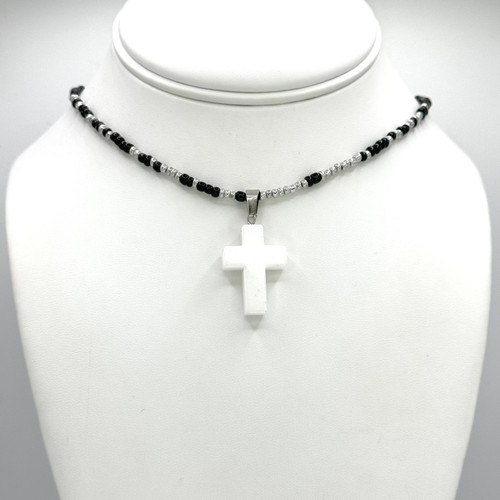 White Cross Pendant on a black & white beaded adjustable 16 inch to 18 inch silver chain with silver findings.
