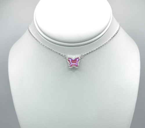 3D soft pink butterfly pendant on a stationary silver chain with silver findings.