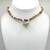 Shark Tooth on Neutral Tan Puka Necklace