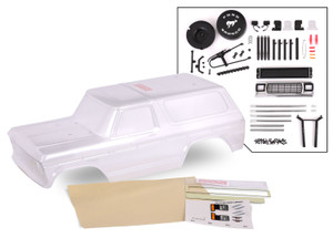 Body, Ford Bronco (1979), complete (clear, trimmed, requires painting) (includes grille, side mirrors, door handles, windshield wipers, spare tire mount, decals, window masks) (requires #8072 inner fenders) Body, Ford Bronco (1979), complete (clear, trimmed, requires painting) (includes grille, side mirrors, door handles, windshield wipers, spare tire mount, decals, window masks) (requires #8072 inner fenders)