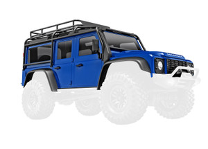 Body, Land RoverÆ DefenderÆ, complete, blue (includes grille, side mirrors, door handles, fender flares, fuel canisters, jack, spare tire mount, & clipless mounting) (requires #9734 front & rear bumpers)