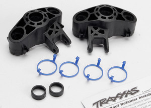 Axle carriers, left & right (1 each) (use with larger 6x13mm ball bearings)/ bearing adapters (for 6x12mm ball bearings) (2)/ dust boot retainers (4) Axle carriers, left & right (1 each) (use with larger 6x13mm ball bearings)/ bearing adapters (for 6x12mm ball bearings) (2)/ dust boot retainers (4)