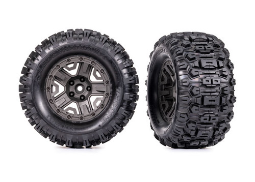 Tires & wheels, assembled, glued (charcoal gray 2.8" wheels, SledgehammerÆ tires, foam inserts) (2) (TSMÆ rated)