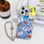 Electroplating Laser Butterfly Phone Case with Wrist Strap