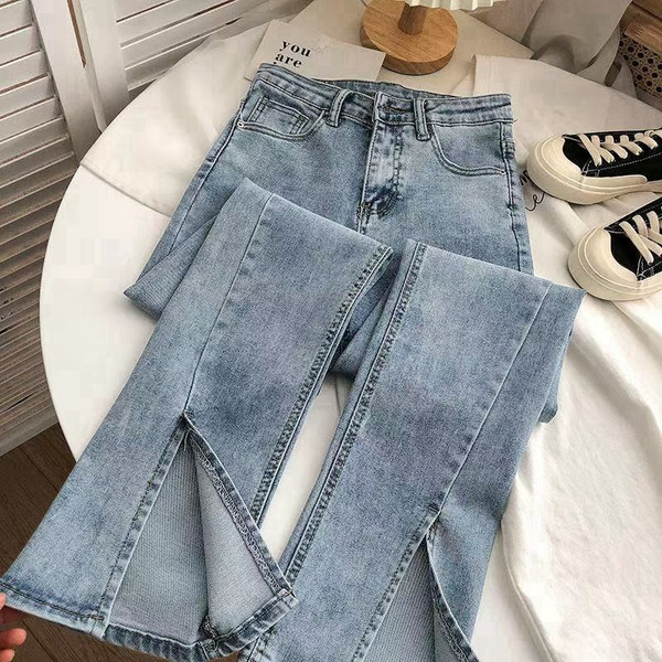 High-waisted Denim Jeans With A Slit At The Hem For Women