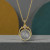 Large Gold Rainbow Moonstone Sol Spinner Necklace