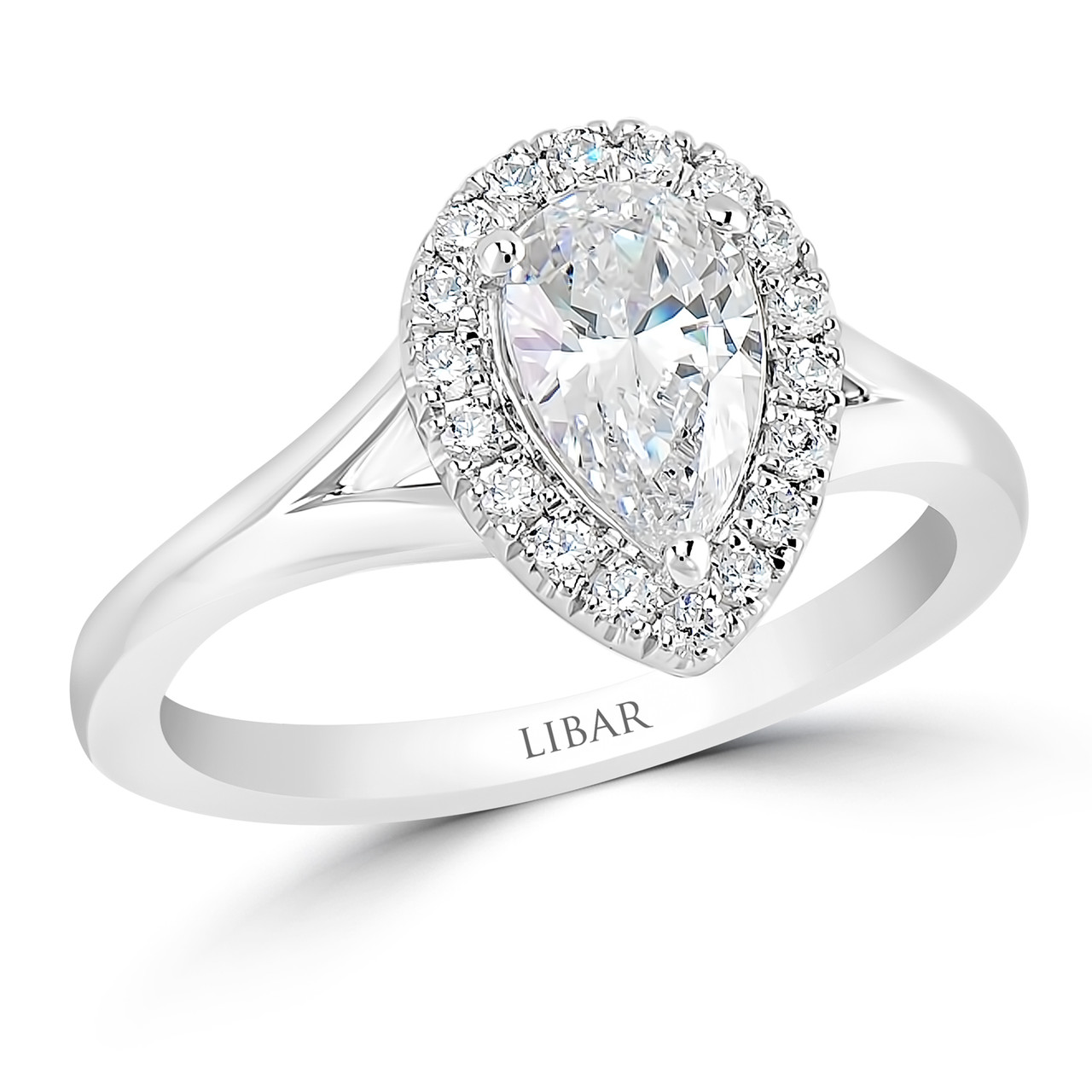 Pear shaped store diamond cathedral setting