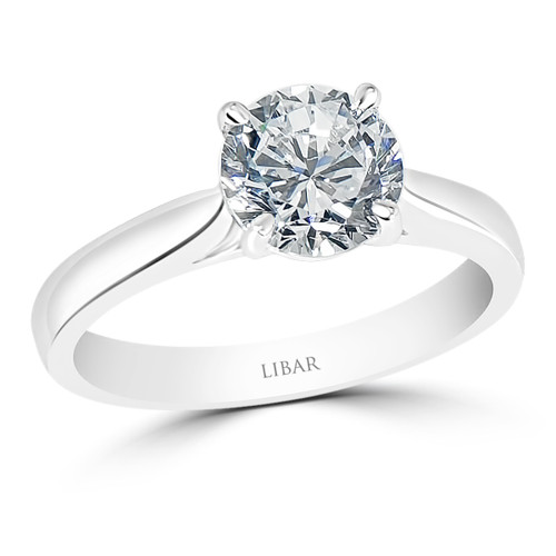 Ladies Four Claw Cathedral Style Ski Tip Solitaire Engagement Ring