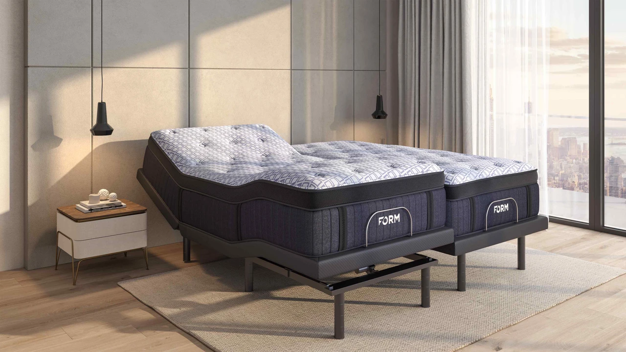 FORM Adjustable Bed Base in a bedroom with the head raised under a FORM mattress