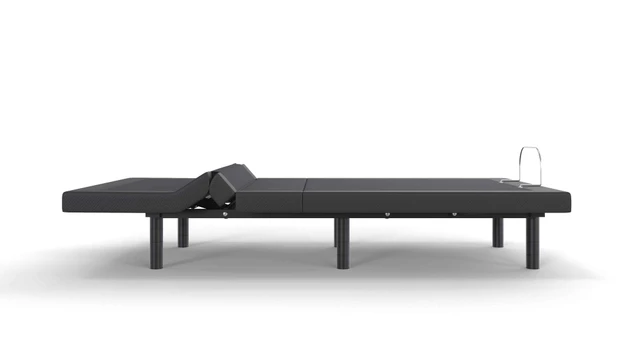 Side view of the FORM Adjustable Bed Base with the lumbar section raised