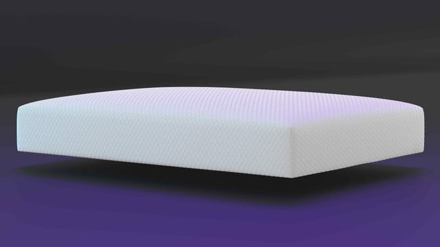 Close-up of the FORM Mattress Protector knit top with FORM branding