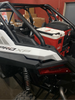 Polaris RZR PRO XP / Turbo R Packout Mount by AJK Offroad Side View with Cooler and three Kits