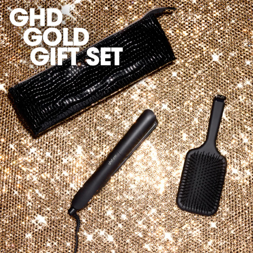 Check-in to polished perfection this festive season and indulge in the art of timeless styling with the ghd Gold® professional advanced styler festive gift set. Paired with the ghd All-Rounder Paddle Brush and a heat-resistant bag,¹ this luxurious set promises effortlessly sleek hair days with a five-star finish.

ghd Gold®, is your go-to professional advanced styler for sleek, silky smooth, and healthier-looking hair4. Equipped with innovative dual-zone technology, this hair straightener guarantees consistent heat distribution across both plates, maintaining the optimum 185˚C styling temperature with no extreme heat meaning you can achieve flawless results from root to tip while maintaining your hair's health. 

With ceramic floating plates coated in a luxurious high gloss finish,  ghd Gold® glides through hair effortlessly, and delivering a polished, shiny finish3 that’s always Insta-ready. Whether you're going for a sleek straight look or playful curls and waves, the sleek rounded design with curved edges makes it super easy to switch up your style with less breakage.²

Thoughtfully designed with convenience in mind, the ghd Gold® styler features a professional-length 2.7m cable, universal voltage, a protective plate guard and a sleep mode that automatically switches off after 30 minutes of non-use- offering ultimate peace of mind whether you're at home or away. It’s all wrapped in a refined heat-resistant bag for easy, stylish storage.¹

Complementing the styler is the ghd All-Rounder Paddle Brush - your go-to for detangling, smoothing and blow drying larger sections of hair with ease. Its broad flat base makes light work of creating sleek, straight styles with a polished finish.

Gold standard of styling leaving hair instantly sleek & smooth2,  65% more shine3