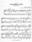 Image: the first page of the score of "Crusader's Hymn" or "Fairest Lord Jesus" as arranged by Daniel Burton. The piece is played in 4/4 time, with 4 flats. Image: the first page of the score of "Crusader's Hymn" or "Fairest Lord Jesus" as arranged by Daniel Burton. The piece is played in 4/4 time, with 4 flats.