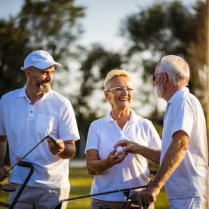 the oldsters playing golf