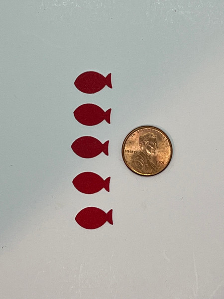 Five fish shaped abrasive hook sharpening pads.  Install one near the BAITLOAD opening. Note:  Penny is included in picture for size reference only and not included in the packet.