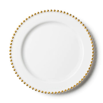 white plastic plates w/ gold beads