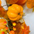Autumn Rattan Faux Silk Foliage Wreath with Artificial Pumpkins detail