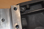 Tapped housing for leaf spring 
