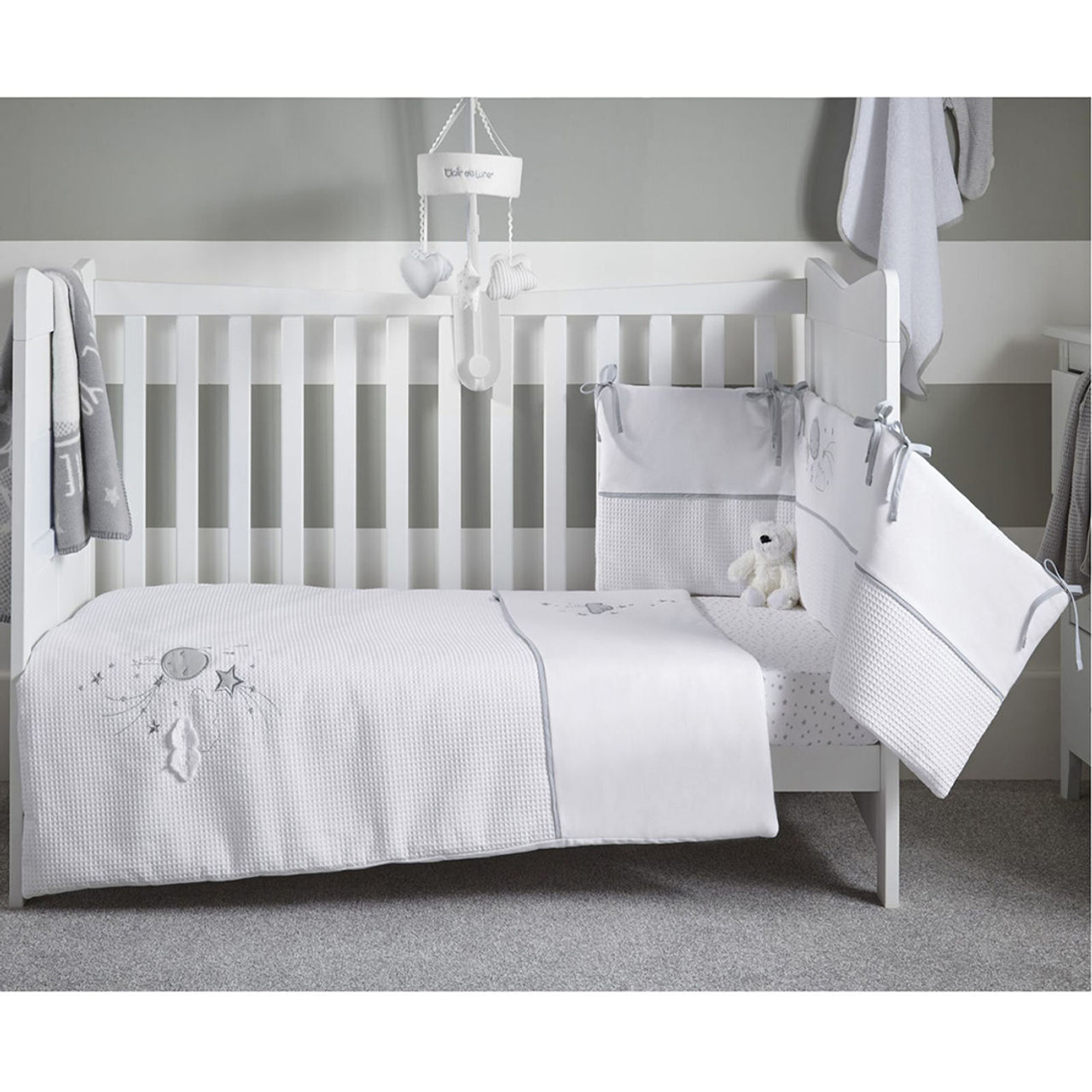grey and white cot bedding