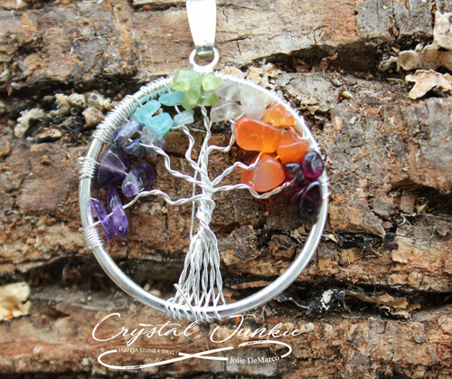 Original wire pendant representing the tree of life and the chakra stones forming the branches and leaves . This pendant will be spiritually cleansed and package with an abundance of gratitude and high vibe positive energy.
