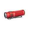 Product photo of the Olight Warrior Nano flashlight in bold red. The compact light features knurled grip, side switch, and a black reversible pocket clip.