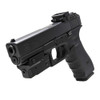 Vism Compact Green Laser mounted on Glock-style pistol