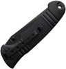Smith & Wesson SWEX1 knife in closed position showing textured handle, pocket clip, and lanyard hole.