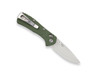 Side view of the Buck Mini Range Pro partially open, showing green handle, satin blade, and pocket clip.