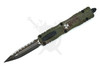 Microtech Dirac Delta 227-3OBDS open – full-serrated double-edge blade with Outbreak Deep Engraved handle and biohazard emblem.